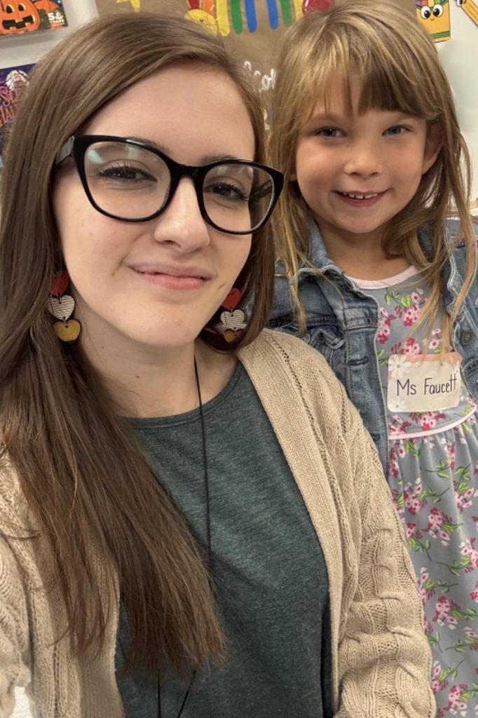 Teacher and student selfie child dressed as teachers on career day  for Red Ribbon Week