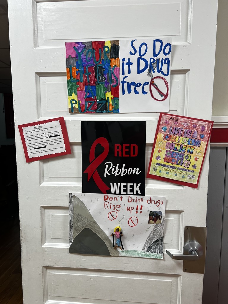 Door decorated with collages decorated by children
