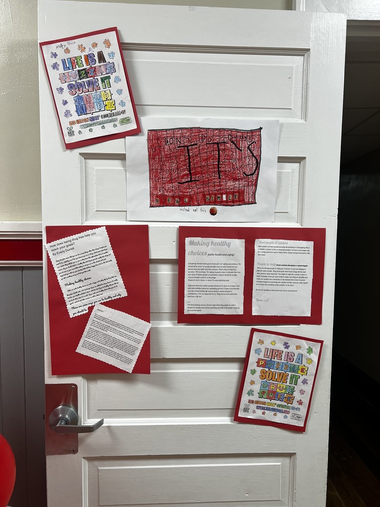 Door decorated with collages decorated by children