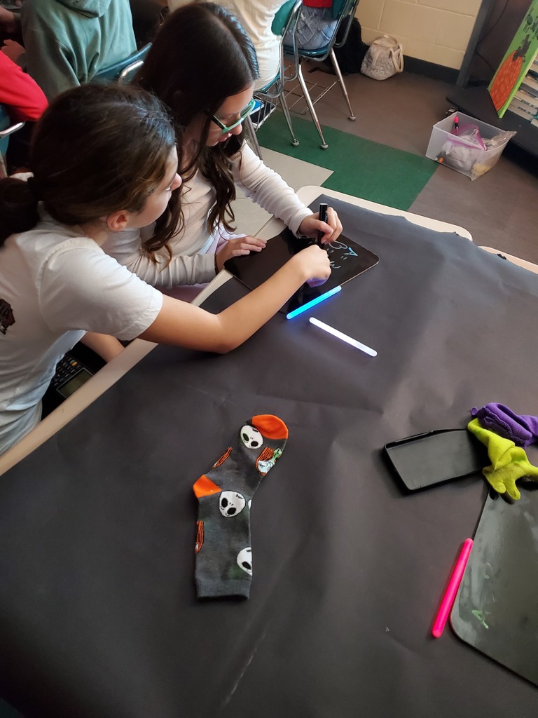 8th Grade Students participating in Halloween Wars math activity