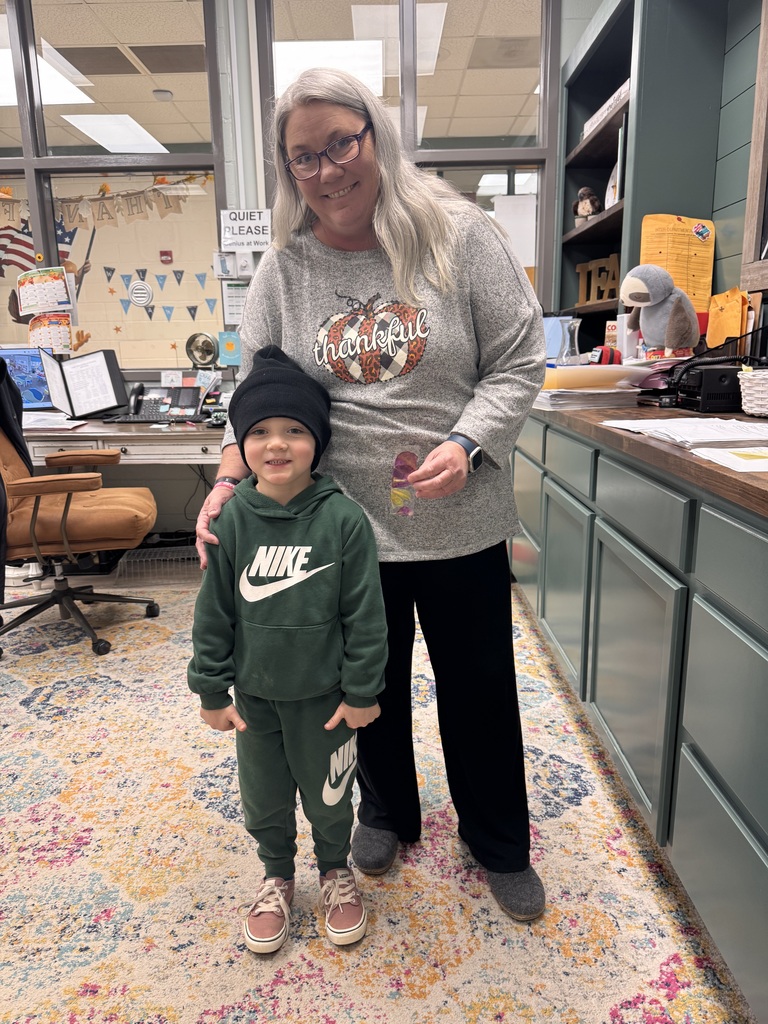 PreK students sharing bookmarks they made.