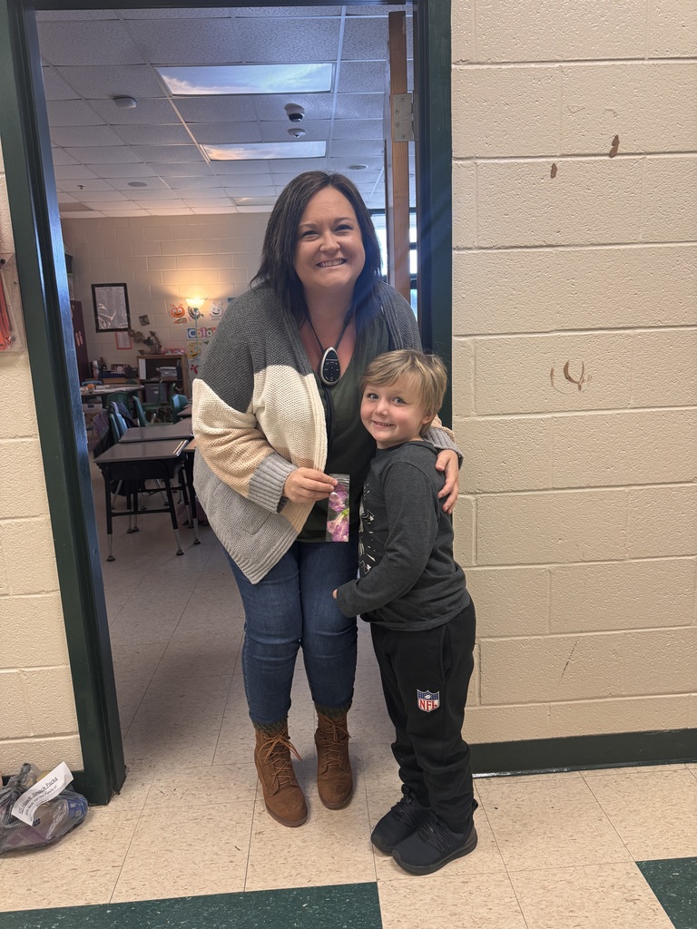 PreK students sharing bookmarks they made.