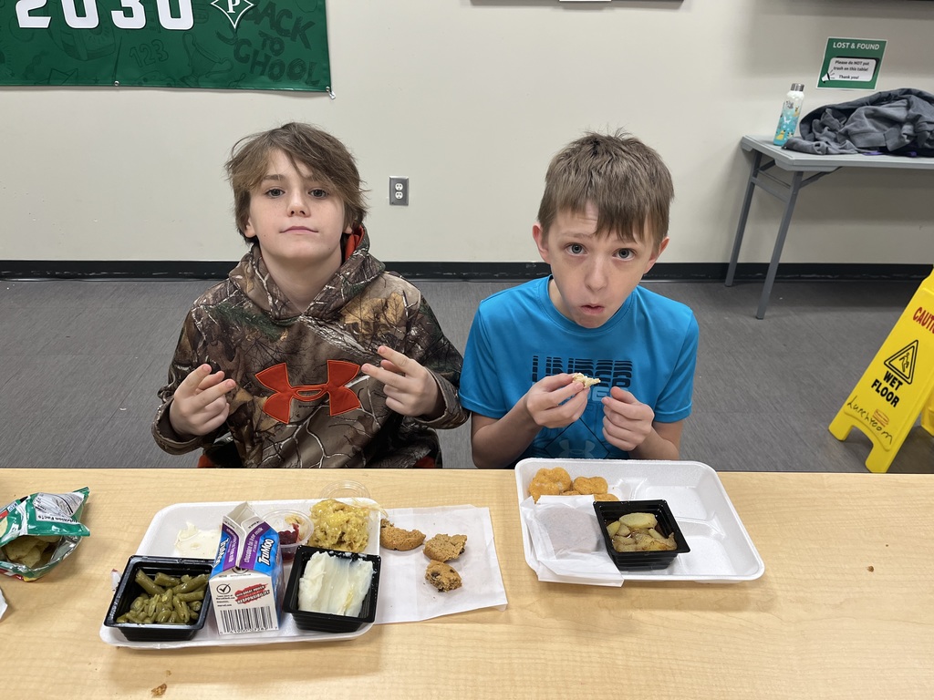 Student enjoying Thanksgiving lunch