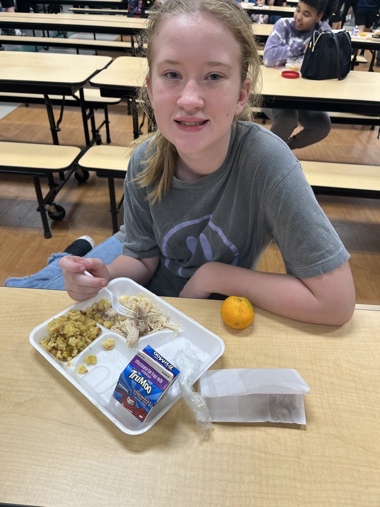Student enjoying Thanksgiving lunch