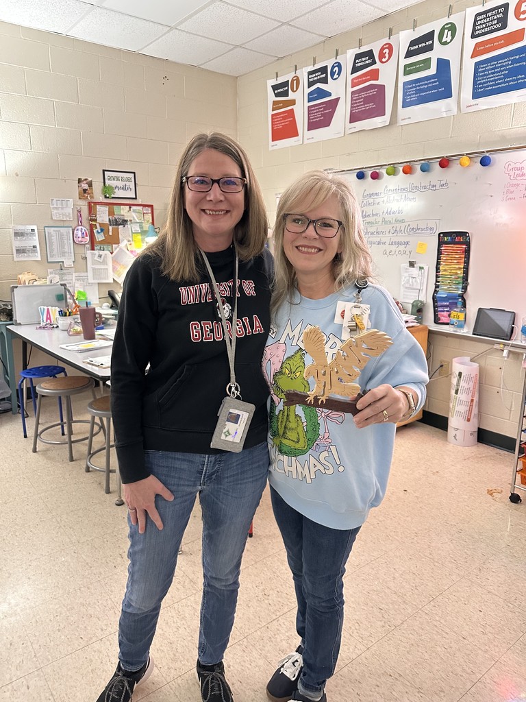 Mrs. Justice passes the Hawk award to Mrs. Childers!