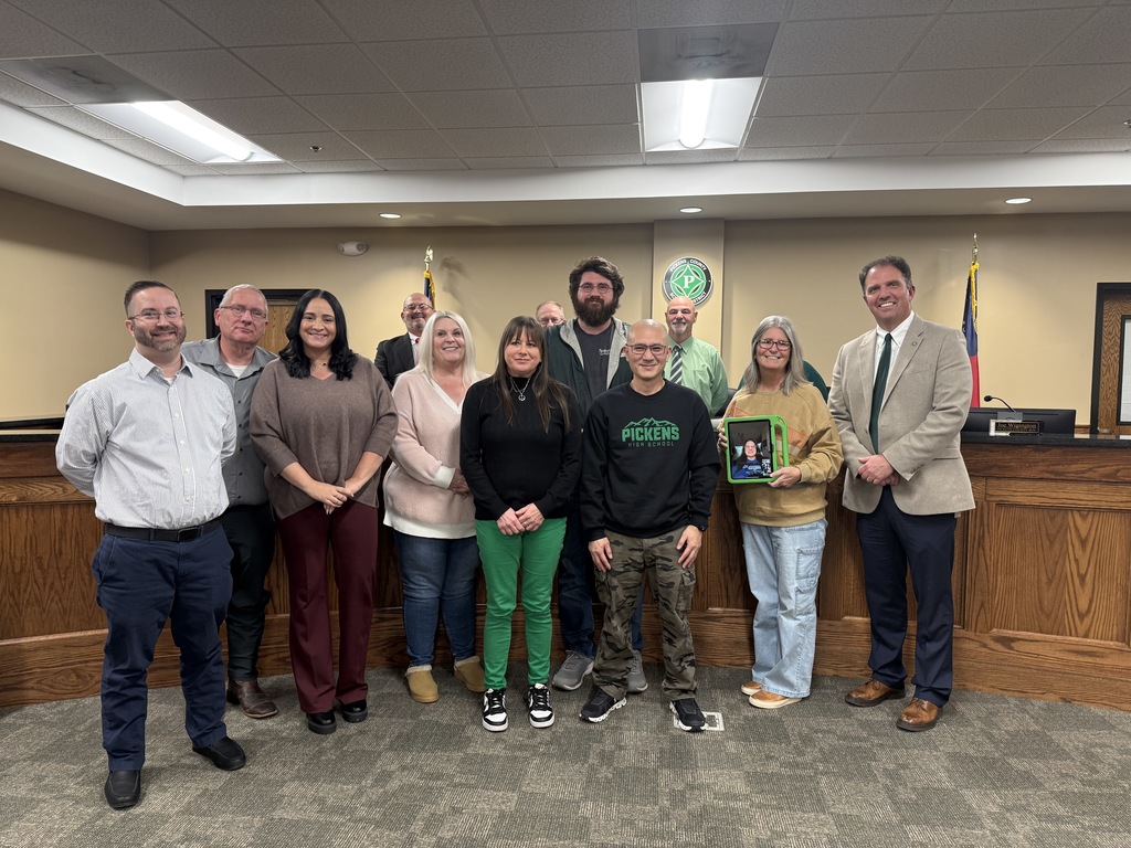 Technology Specialist being honored at the December Board meeting. 
