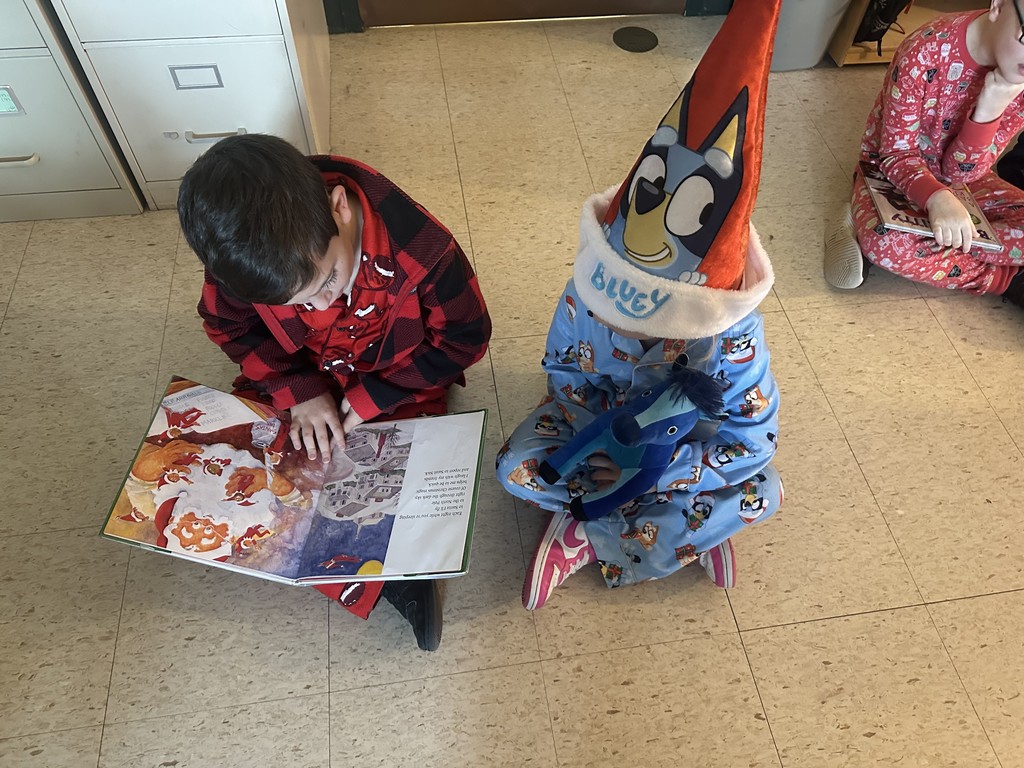 Mrs. Culbreth's third graders read to Mrs. Roper's kindergarten.