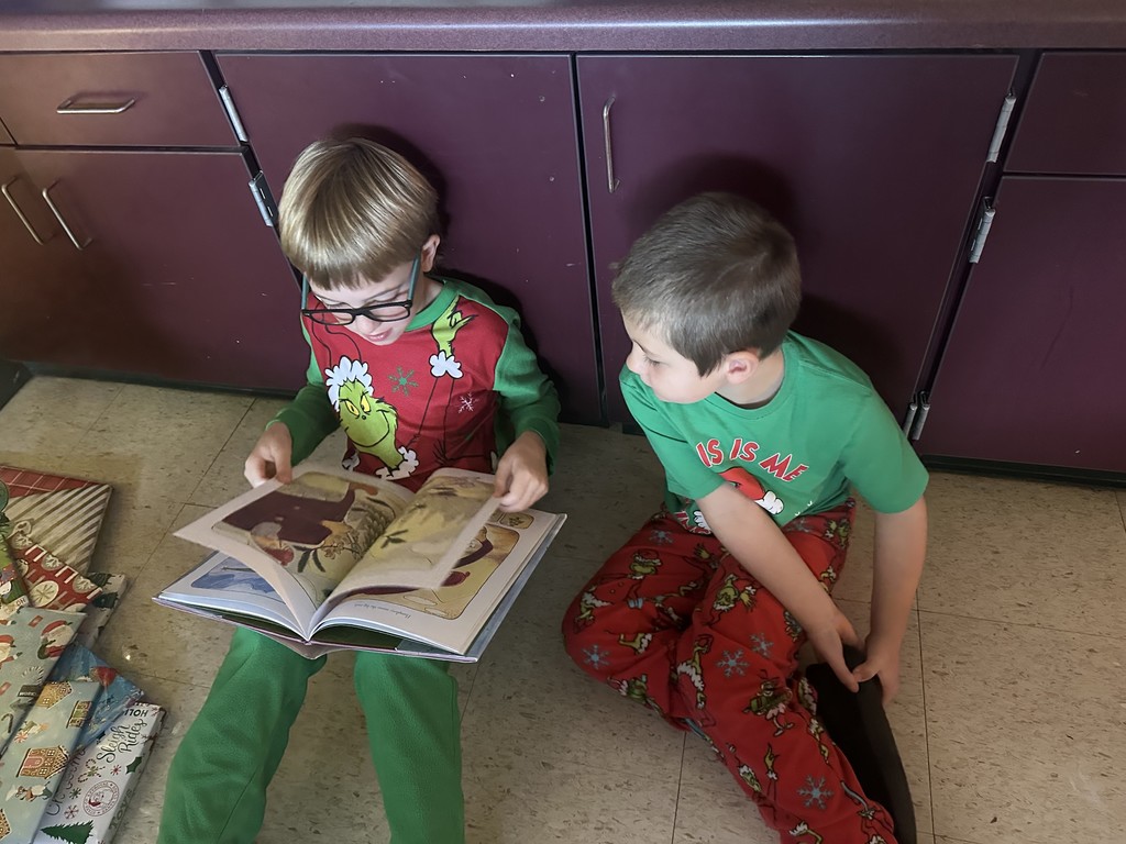 Mrs. Culbreth's third graders read to Mrs. Roper's kindergarten.