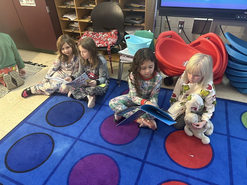 Mrs. Culbreth's third graders read to Mrs. Roper's kindergarten.