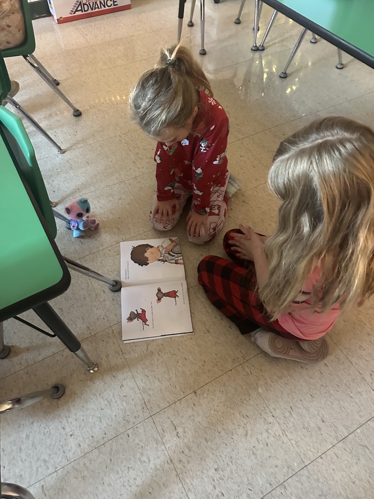 Mrs. Culbreth's third graders read to Mrs. Roper's kindergarten.