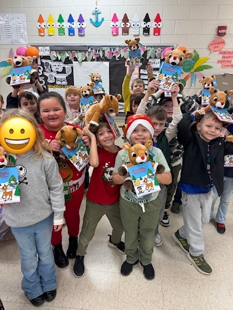 Mrs. Sultan's class with their Rudolph stuffies and books.