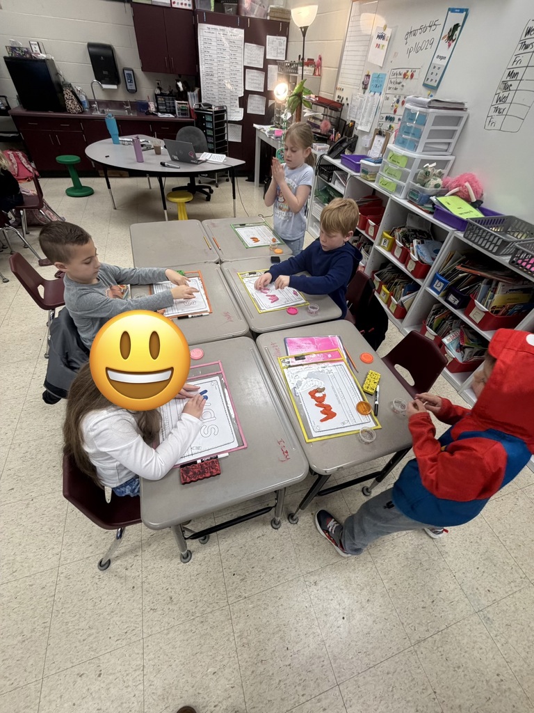 Mrs. Shealey's first graders are working hard at their independent centers.