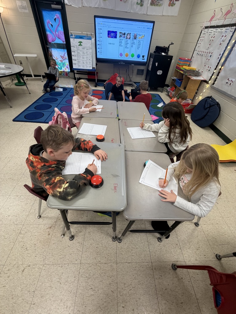 Mrs. Shealey's first graders are working hard at their independent centers.
