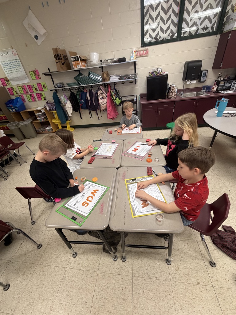Mrs. Shealey's first graders are working hard at their independent centers.