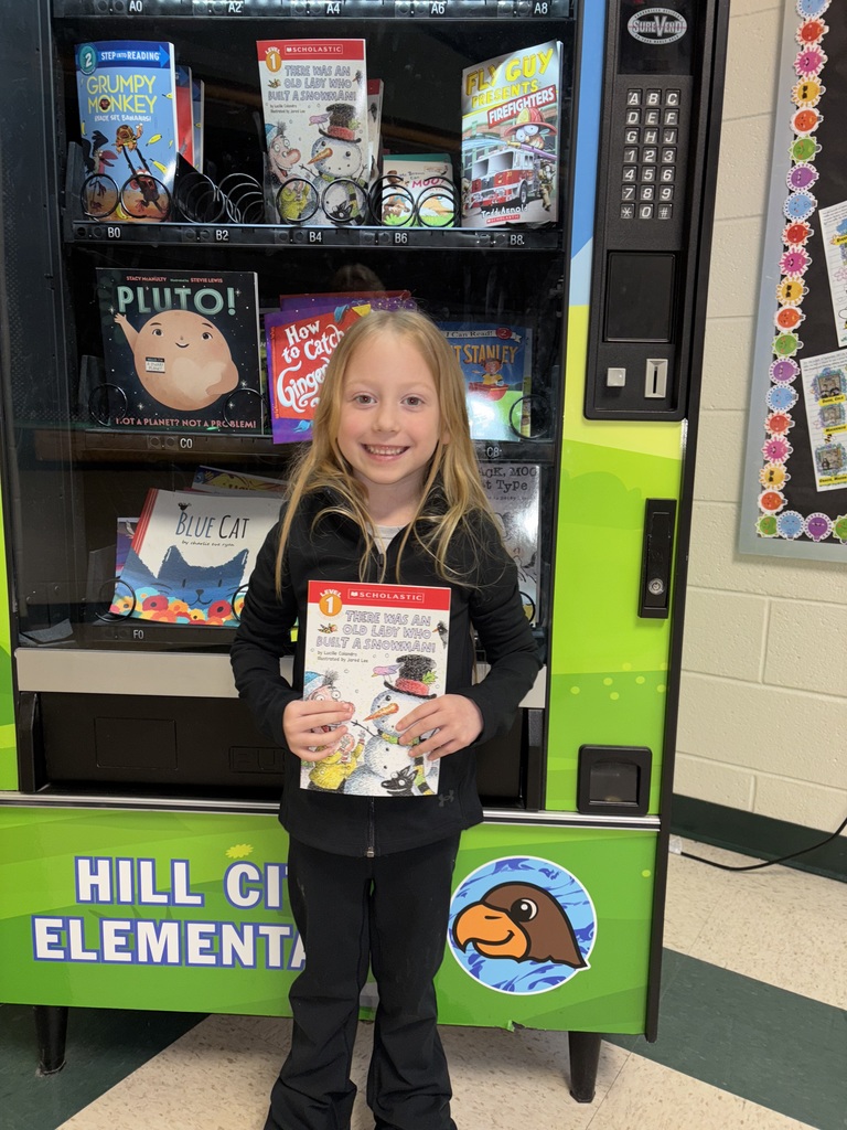 Eevee earned a visit to the Book Vending Machine for completing her sight words.