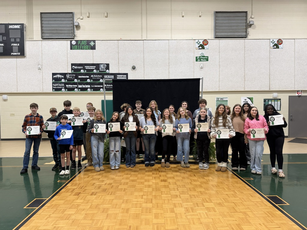 7th Grade Honor Roll students with their certificates