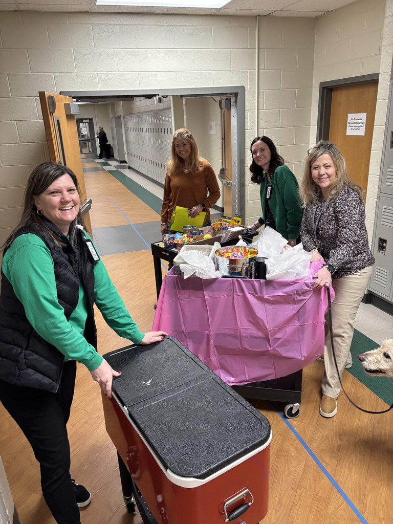 Members of PJHS Admin in the hall with treat carts