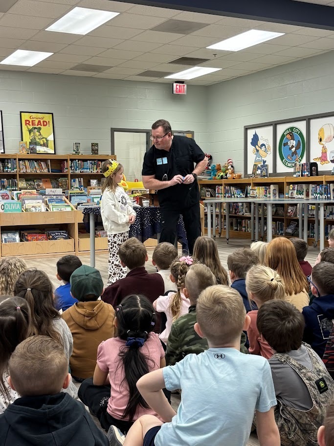 Dr. Pryor visits with kindergarten for a dental hygiene presentation.