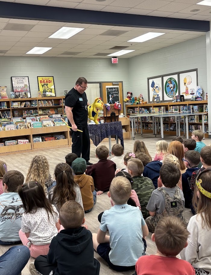Dr. Pryor visits with kindergarten for a dental hygiene presentation.