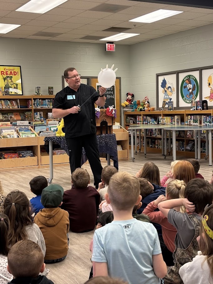 Dr. Pryor visits with kindergarten for a dental hygiene presentation.