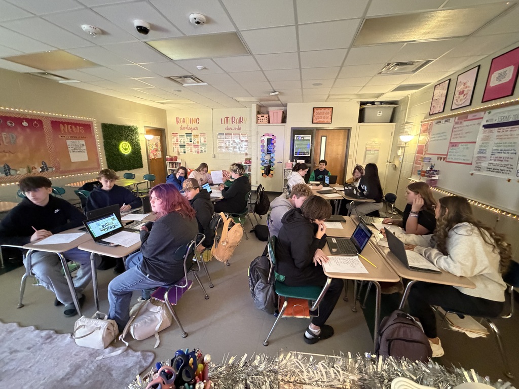 Students sitting at desks in classroom
