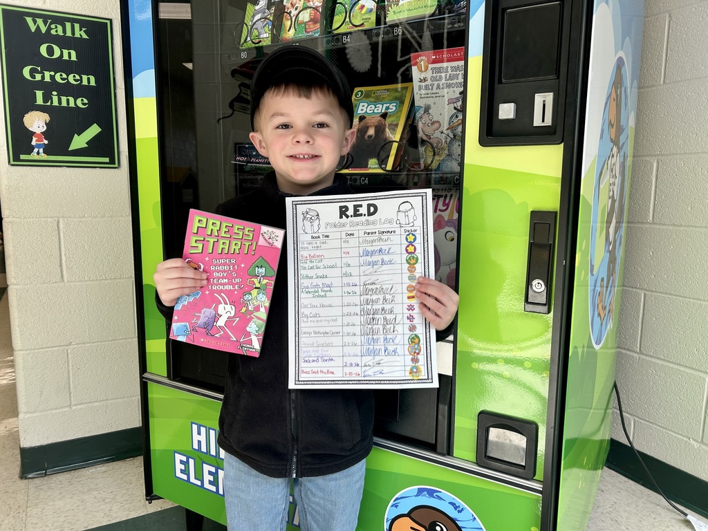 Carter read 14 books for his kindergarten reading to earn a trip to the Book Vending Machine!