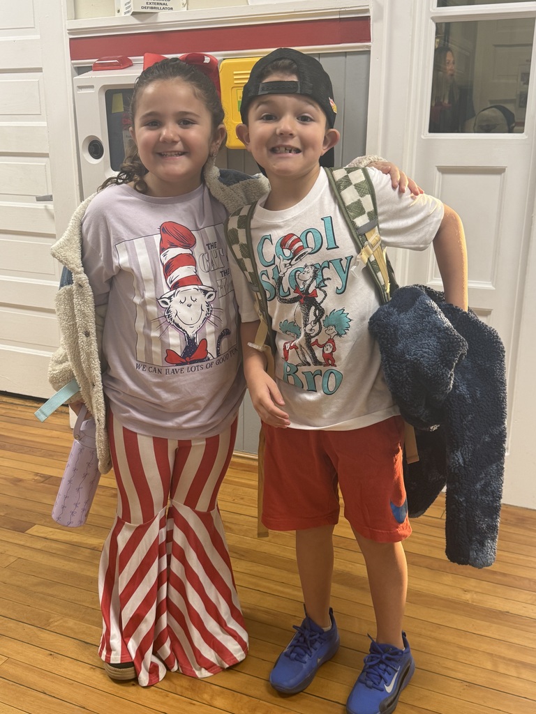 boy and girl in dr seuss clothes