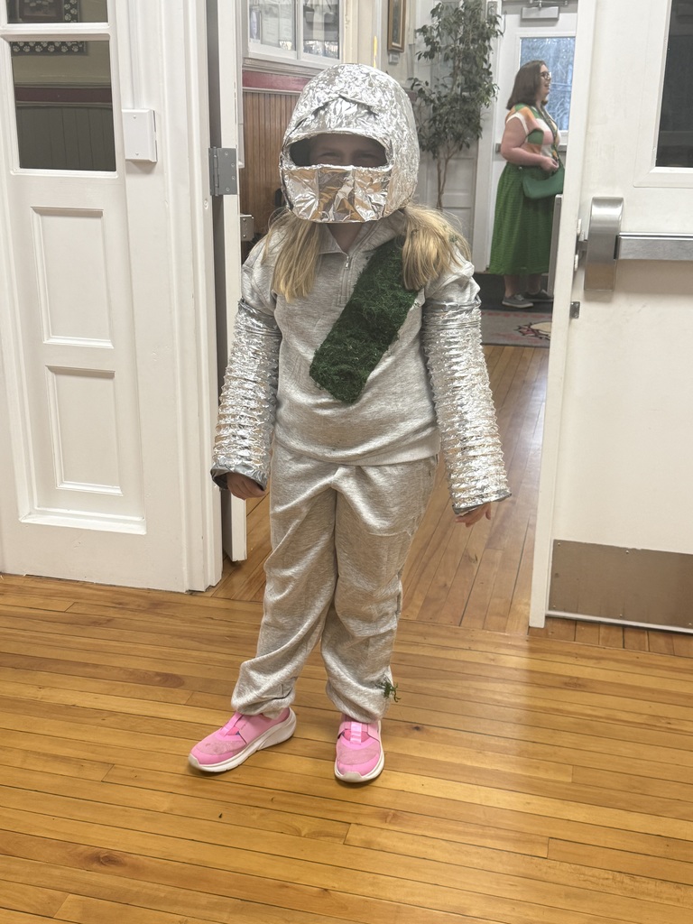 girl dressed as an astronaunt
