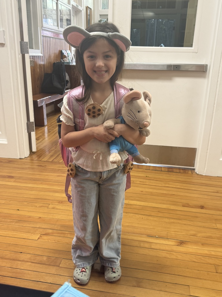 Child dressed up as a mouse from the book if you give a  mouse a cookie.
