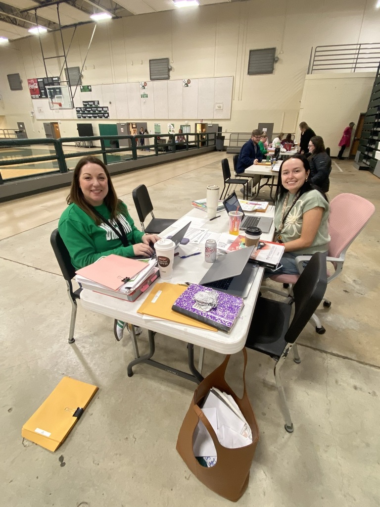 Teachers Jacqueline Allen and Torie Sutton enjoying their biscuits