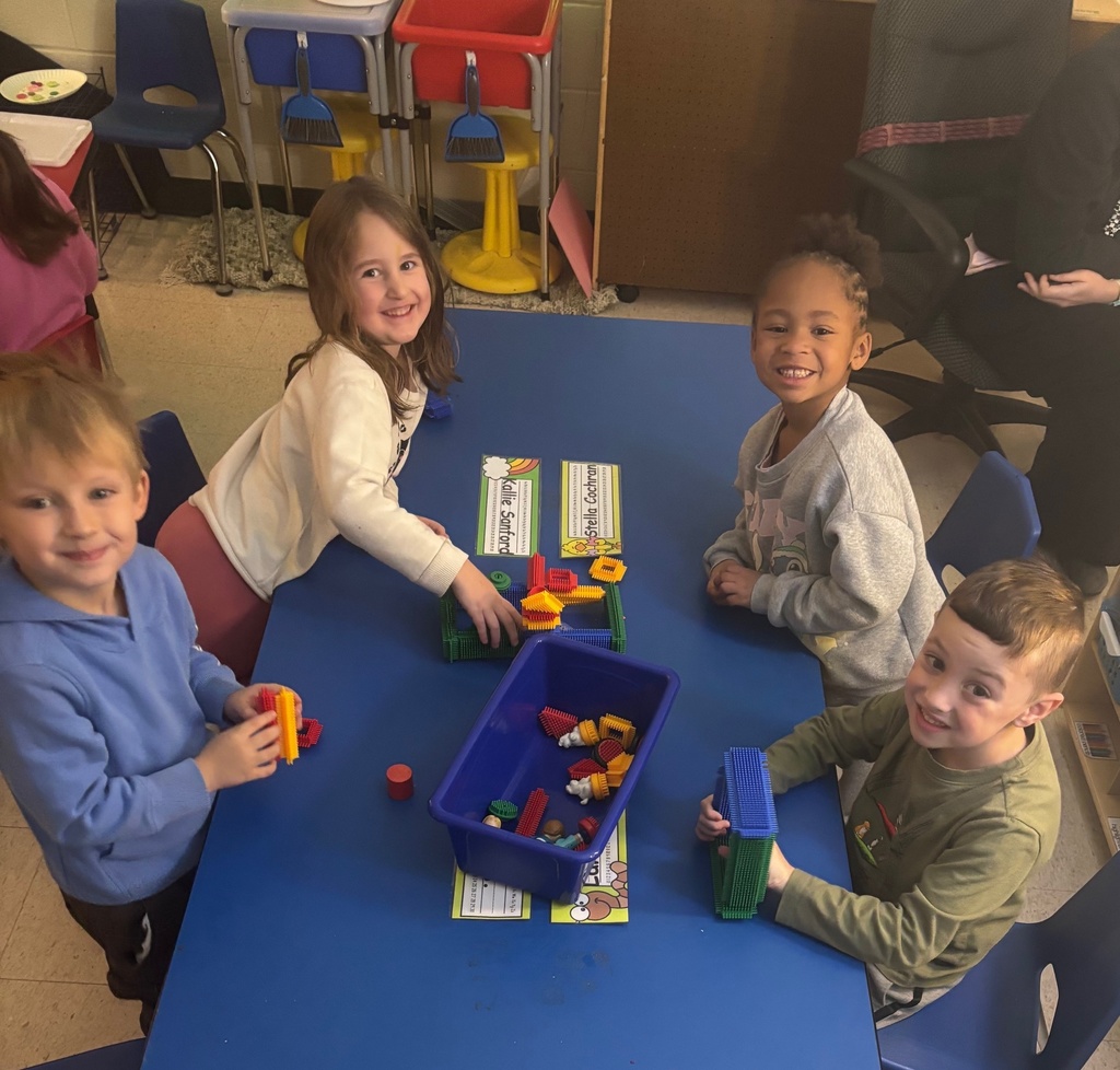 After reading about construction workers, Mrs. Anderson's PreK students constructed houses for their animals using different building materials.