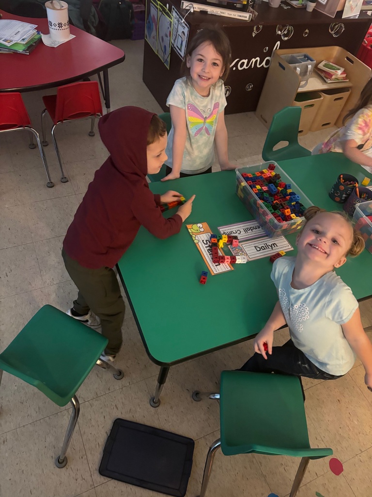 After reading about construction workers, Mrs. Anderson's PreK students constructed houses for their animals using different building materials.