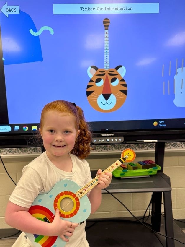 It's TinkerTar time in Mrs. Richards' music class! Kindergarten, 1st, and 2nd-graders are learning about the instrument families and get to play the TinkerTar, a one-stringed instrument, after they learn about the string family this week! These instruments were purchased with grants from the Bent Tree Foundation. 
