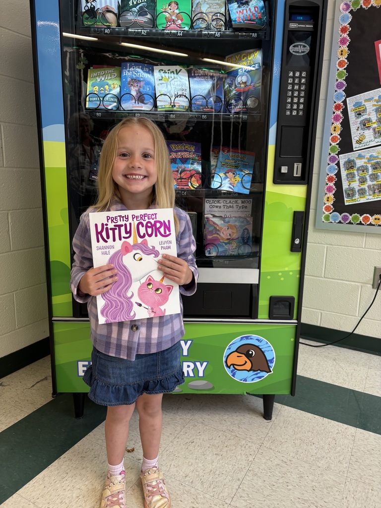 Cheers for Naomi!   This kindergartner in Mrs. Dilbeck’s class mastered all her sight words and celebrated with a visit to the Book Vending Machine! Way to go, Naomi!
