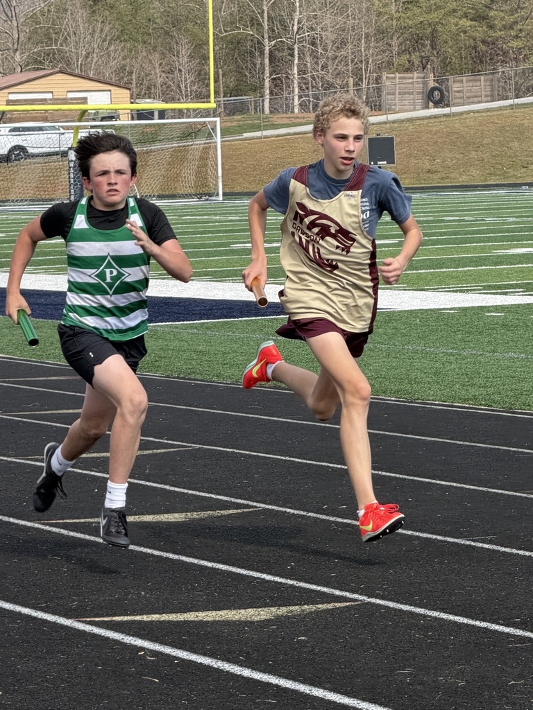 Students running in relay race