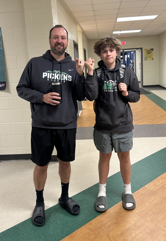 Teacher and student wearing same thing