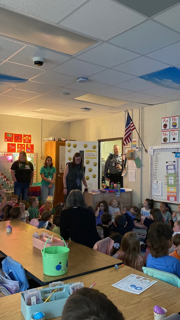Classroom full of students and teachers 