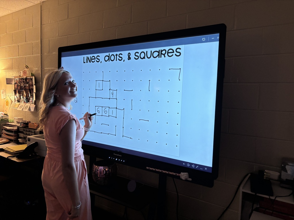 Student writing on Promethean Board