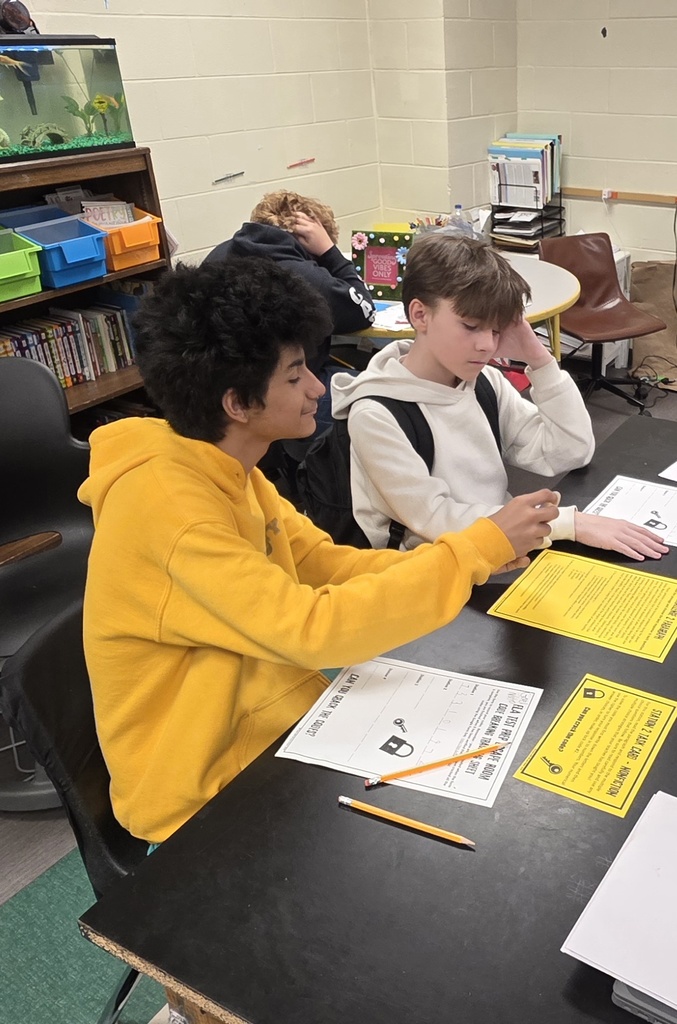 students solving an escape room