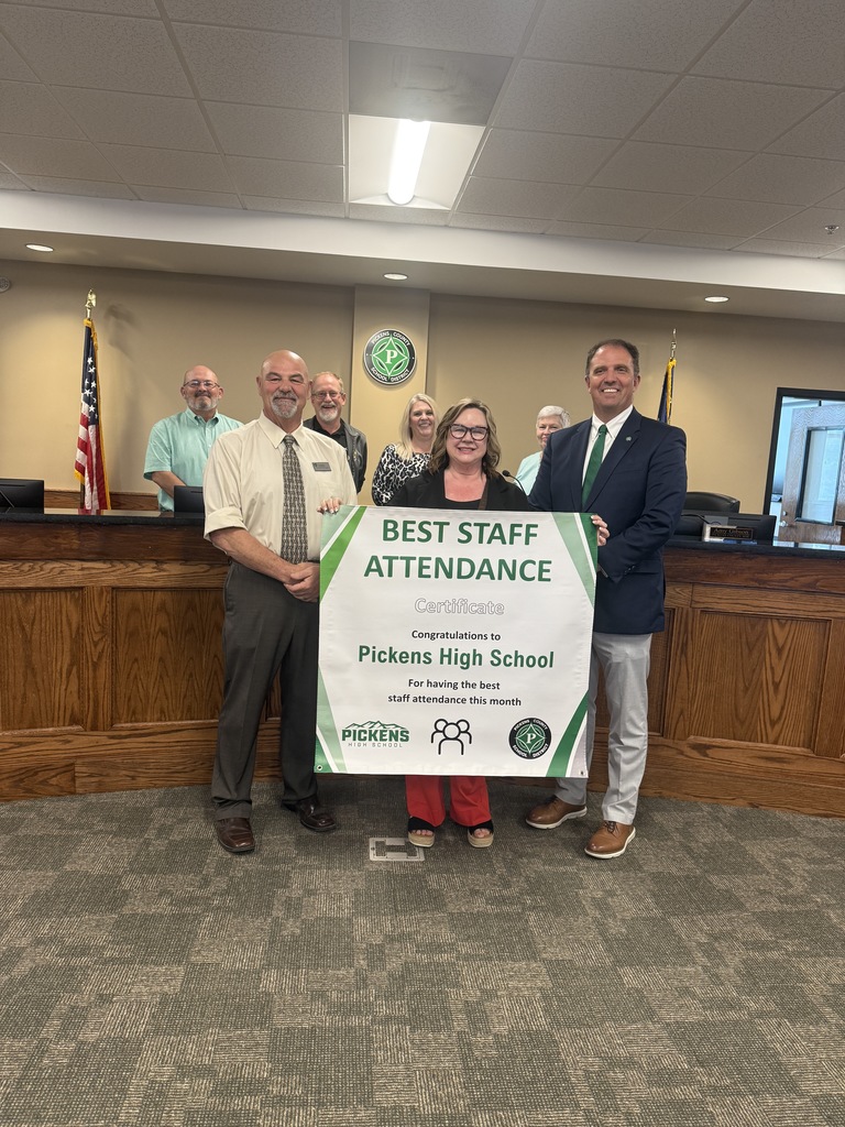 PHS best staff attendance for March, with Dr. Thomas and Board member