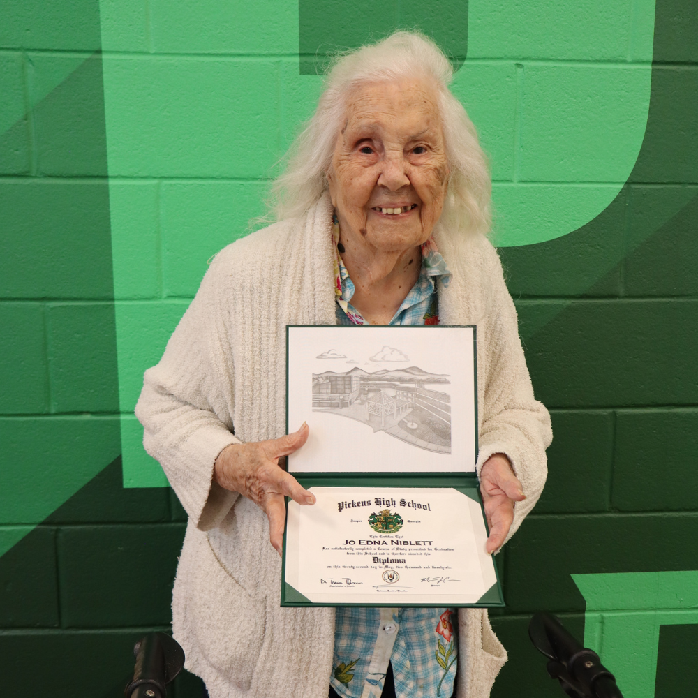 Jo Edna Niblett with honorary diploma