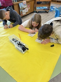 Here’s Mrs. Connelly’s class of talented poets working hard in the media center with Mrs. Hardison and Mrs. Jamie on blackout poetry.