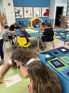 Here’s Mrs. Connelly’s class of talented poets working hard in the media center with Mrs. Hardison and Mrs. Jamie on blackout poetry.