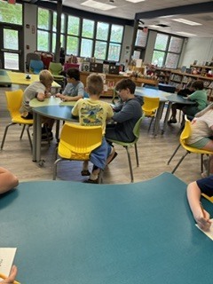 Here’s Mrs. Connelly’s class of talented poets working hard in the media center with Mrs. Hardison and Mrs. Jamie on blackout poetry.