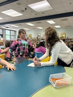 Here’s Mrs. Connelly’s class of talented poets working hard in the media center with Mrs. Hardison and Mrs. Jamie on blackout poetry.