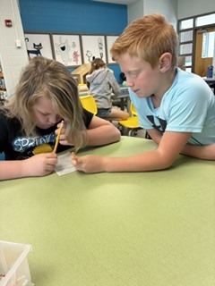Here’s Mrs. Connelly’s class of talented poets working hard in the media center with Mrs. Hardison and Mrs. Jamie on blackout poetry.