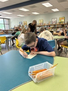 Here’s Mrs. Connelly’s class of talented poets working hard in the media center with Mrs. Hardison and Mrs. Jamie on blackout poetry.