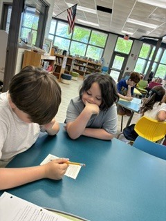 Here’s Mrs. Connelly’s class of talented poets working hard in the media center with Mrs. Hardison and Mrs. Jamie on blackout poetry.