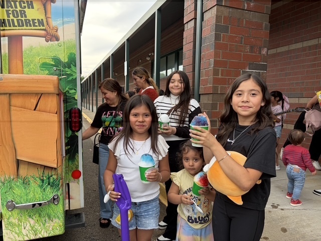 ESOL families enjoying Kona Ice
