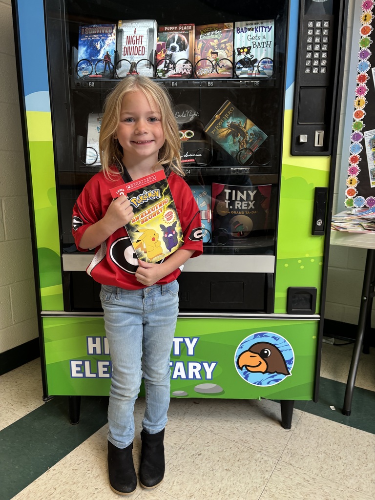 Way to go, Raelynn! 🎉 This kindergartner in Mrs. Gartrell’s classroom has completed her literacy folder and earned a special trip to the Book Vending Machine to celebrate!